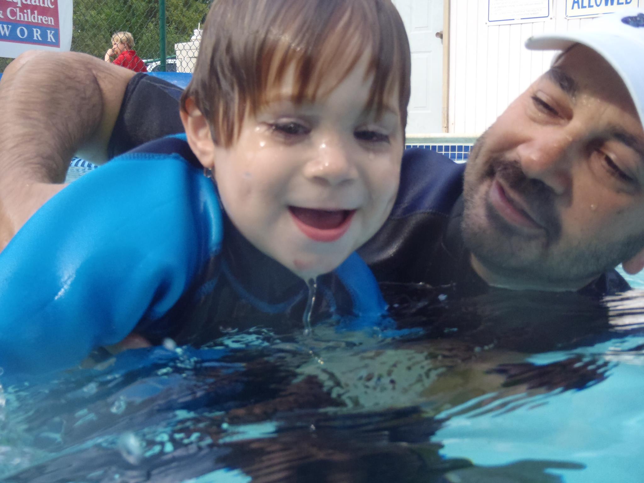 Child Swimming Under Water